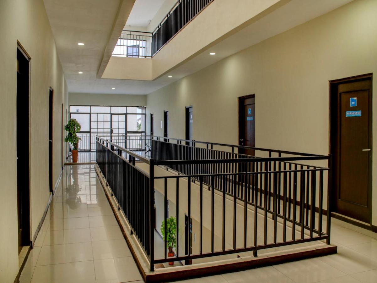 Oyo 90162 Remboelan Guest House Sungai Lutus Экстерьер фото