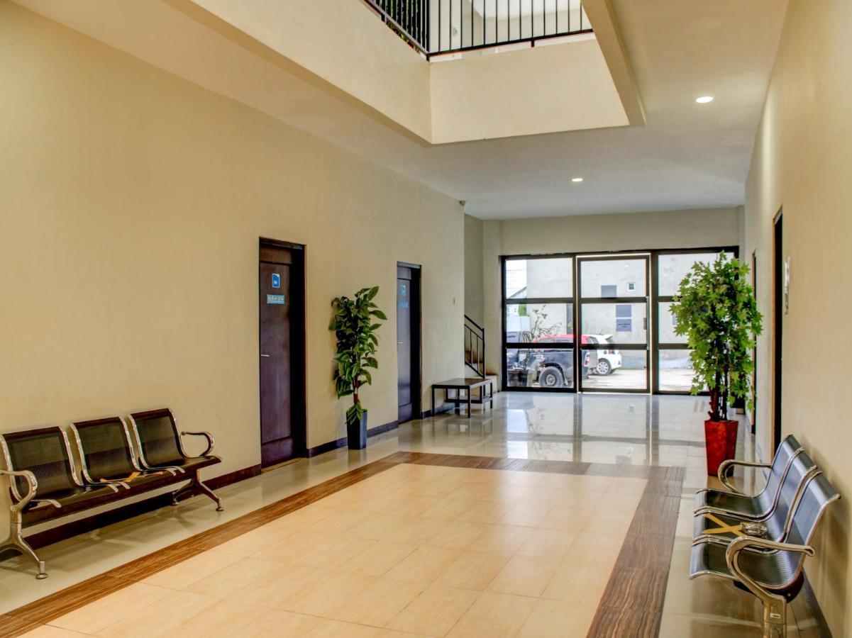 Oyo 90162 Remboelan Guest House Sungai Lutus Экстерьер фото