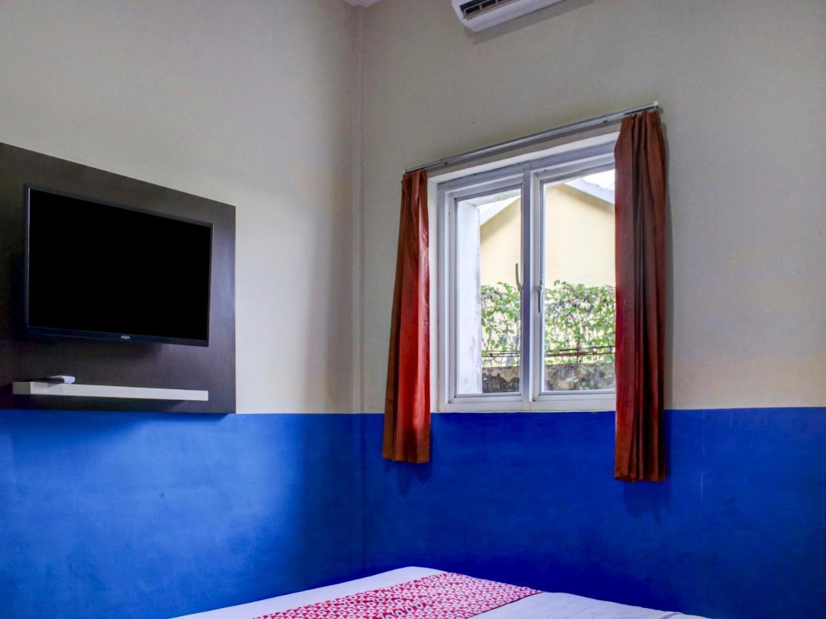 Oyo 90162 Remboelan Guest House Sungai Lutus Экстерьер фото